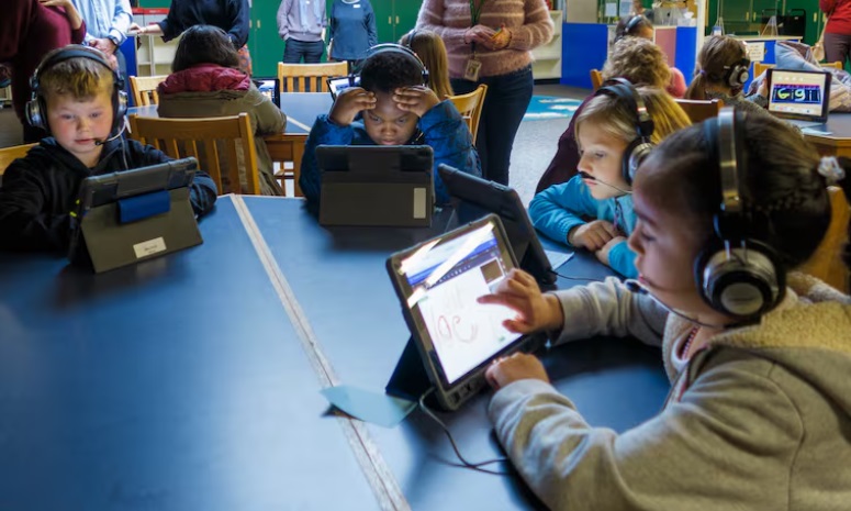 students working on tablets